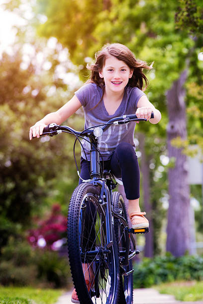 istock Healthy happy active girl on bicycle 529144920