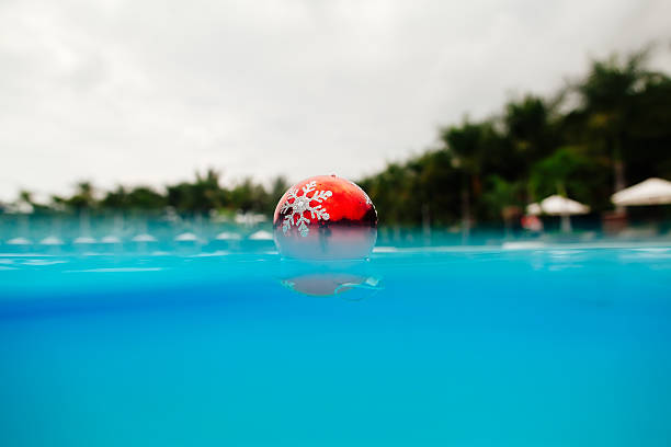 istock new year tree decoration flowing in the blue water 529158199