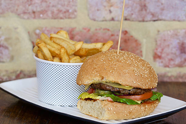 istock Tasty burger with melted cheese and thick succulent ground beef 529158241