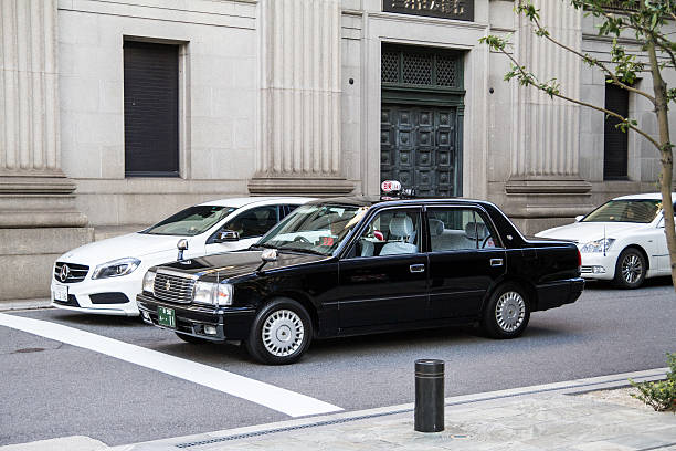 タクシーでオサカ-日本 - タクシー ストックフォトと画像