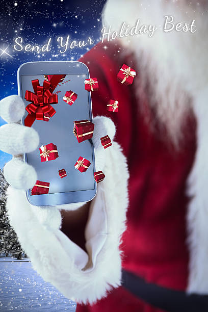istock Composite image of santa claus shows a smartphone 529174441