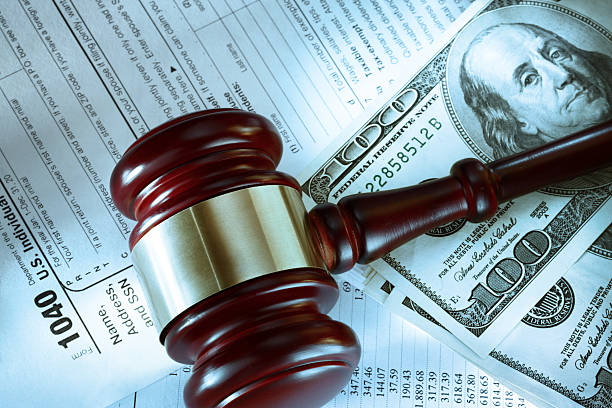istock Budget, tax form, gavel and dollars 529175391