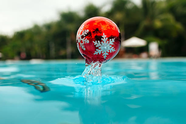 new year tree decoration splashes from the bleu water