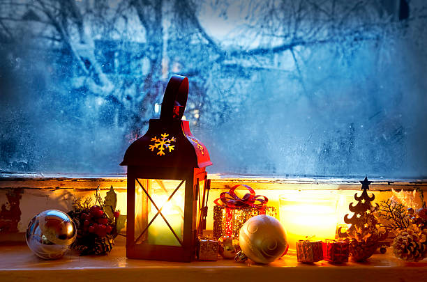 istock Warm Lantern on Frozen Window,Winter Magic with Christmas Decora 529181079