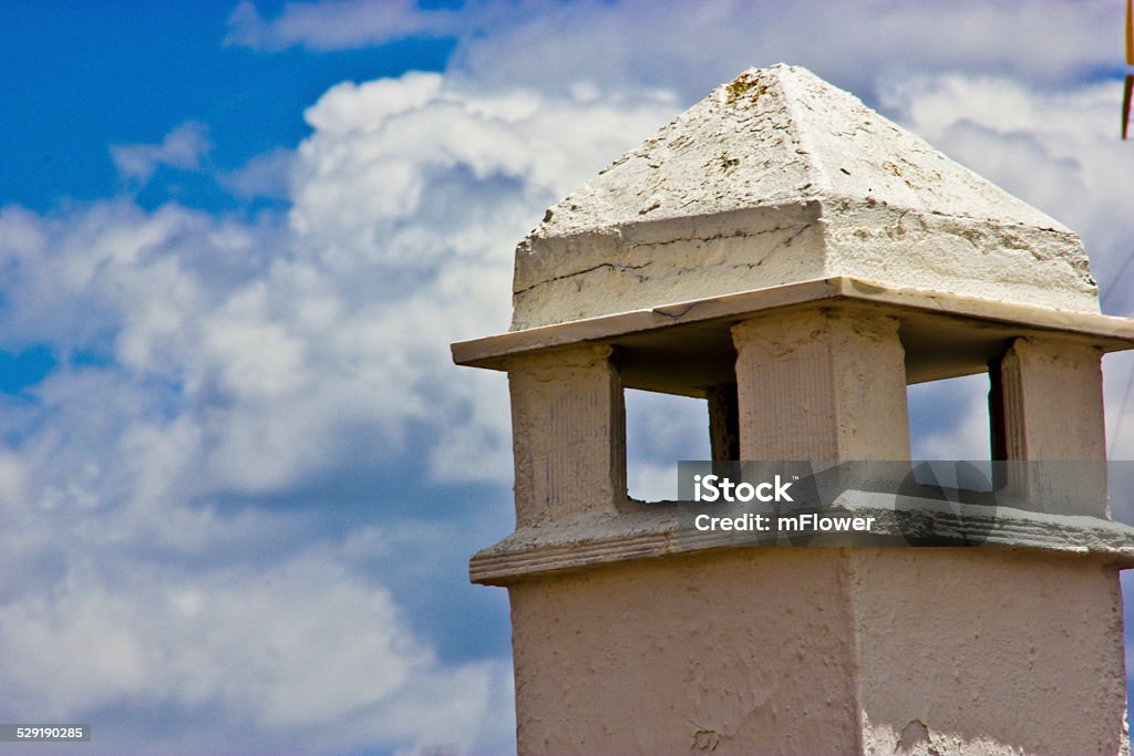 Chimney with cloudly sky Old white chimney with cloudly sky Air Duct Stock Photo