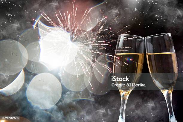 Glasses With Champagne Against Fireworks Stock Photo - Download Image Now - Alcohol - Drink, Anniversary, Backgrounds