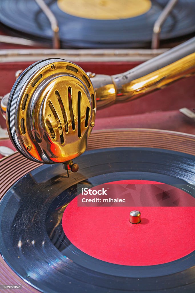 old gramophone view on speaker on vinil disk Gramophone Stock Photo
