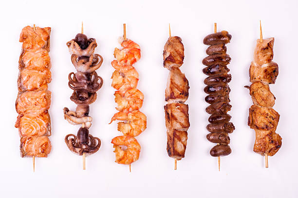 conjunto de diferentes brochetas de carne - shrimp grilled prepared shrimp barbecue fotografías e imágenes de stock