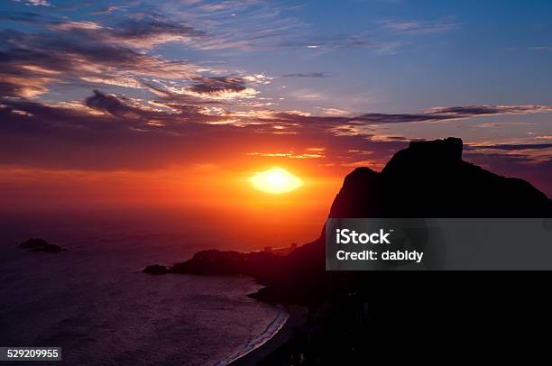 Mountain Silhouette By Sunset Stock Photo - Download Image Now - At The Edge Of, Atlantic Ocean, Beach