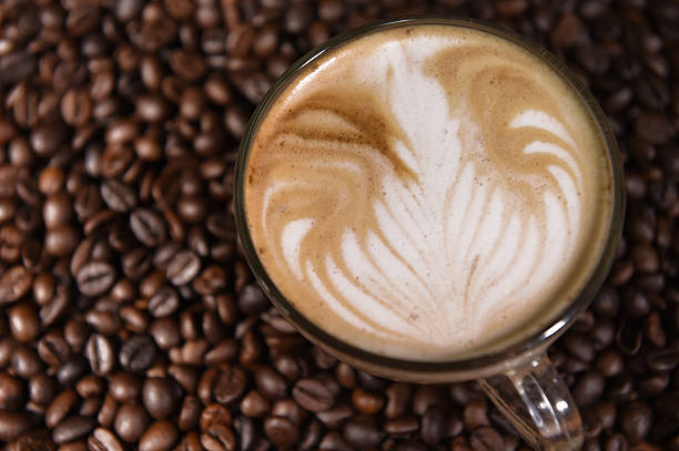 istock Latte art, coffee in coffee beans background 529211907