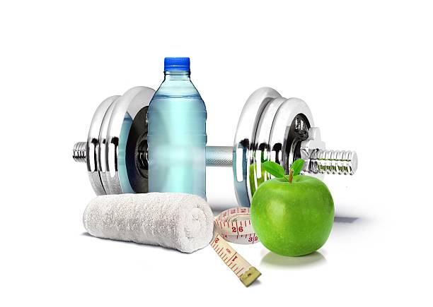 istock Fitness Concept with Dumbbell and Apple 529220711