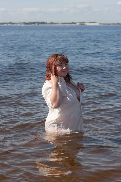 istock girl in a wet shirt 529220929