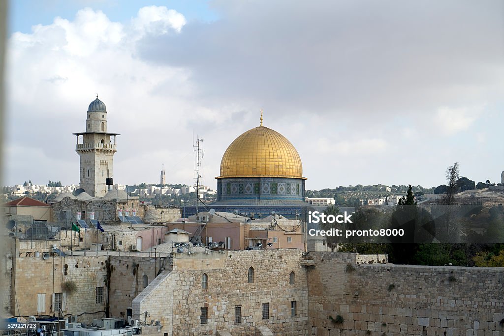 Dome of the Rock The sacred Dome of the Rock is framed against a cloudscape in the Old City of Jerusalem. Al-Aqsa Mosque Stock Photo