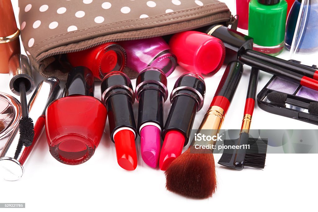 bag with cosmetics Make up bag with cosmetics and brushes isolated on white Adult Stock Photo