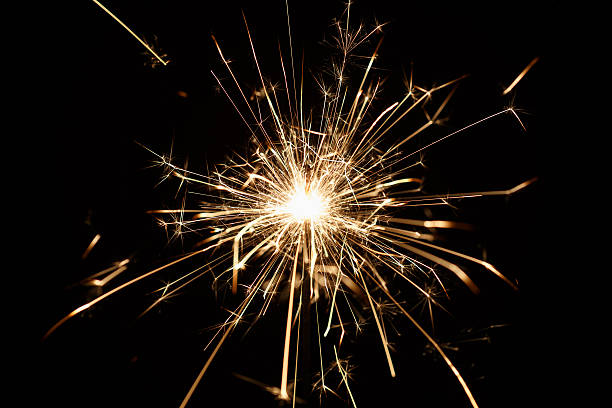 istock Christmas sparkler on black background 529223195
