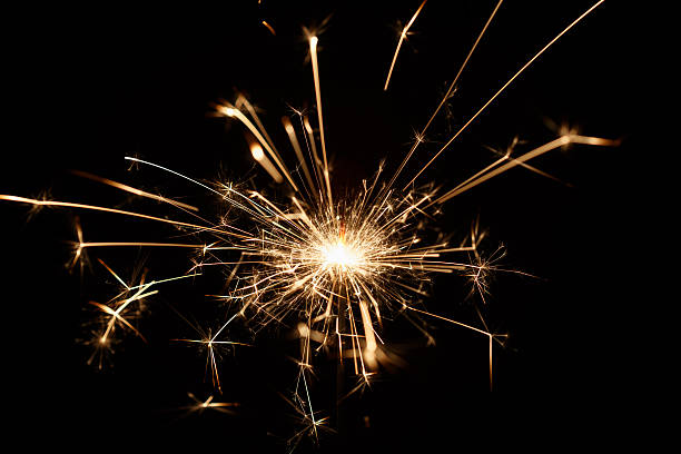 istock Christmas sparkler on black background 529223199