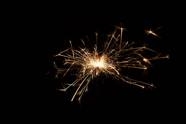 istock Christmas sparkler on black background 529223211