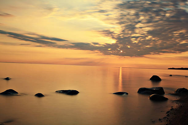 istock sunset on the lake blurred water 529223819
