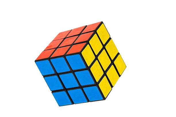 Rubiks cube London, United Kingdom - December 18, 2014:   An image of an isolated and completed Rubik's Cube.  The Rubik's Cube was invented by the Hungarian sculptor and professor Erno Rubik in 1974. puzzle cube stock pictures, royalty-free photos & images