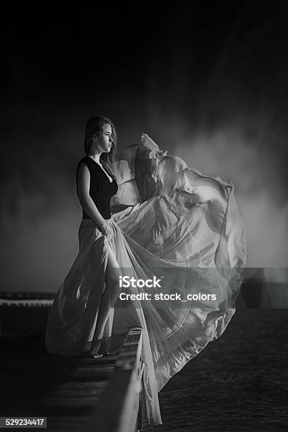 Mystery And Wind Stock Photo - Download Image Now - 25-29 Years, Adult, Adults Only