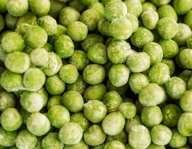 istock Frozen sweet green peas 529234477