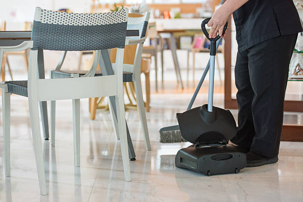 Sweeping floor Sweeping floor indoors restaurant hotel work tool stock pictures, royalty-free photos & images