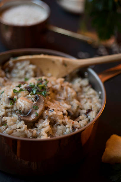 istock Mushroom and Sun-dried Tomato Risotto in a Copper Saucepan 529236235