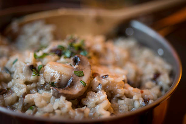 istock Mushroom and Sun-dried Tomato Risotto in a Copper Saucepan 529236237