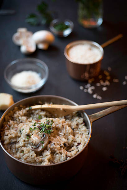 istock Mushroom and Sun-dried Tomato Risotto in a Copper Saucepan 529236241
