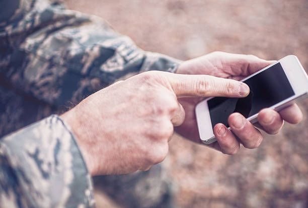 istock US military soldier using digital technology in the field 529236533