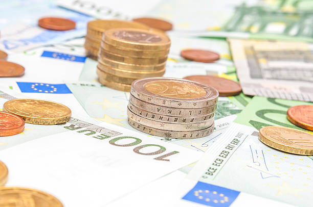 istock Money euro coins and banknotes 529236695