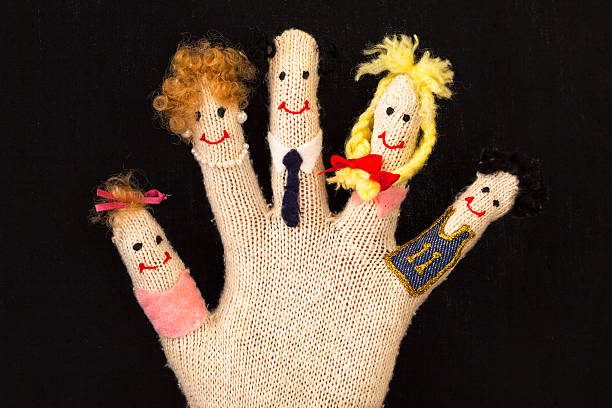 istock Family members faces on glove 529238941