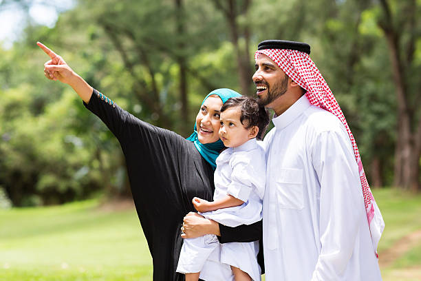 arabian family in the forest stock photo