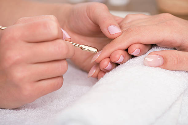 istock client and manicurist in manicure salon 529240715