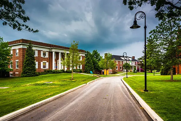 Storm clouds over building and road at Gettysburg College, Pennsylvania.