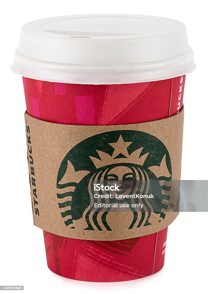 New Year Concept of Starbucks Ankara, Turkey - December 10, 2014:  A Starbucks disposable coffee cup with new year design. Studio shot of tall size paper cup isolated on white background. Starbucks is an international coffee company based in Seattle, Washington.  It is the largest coffeehouse chain in the world, with almost 20 thousand stores in 58 countries Brand Name Stock Photo