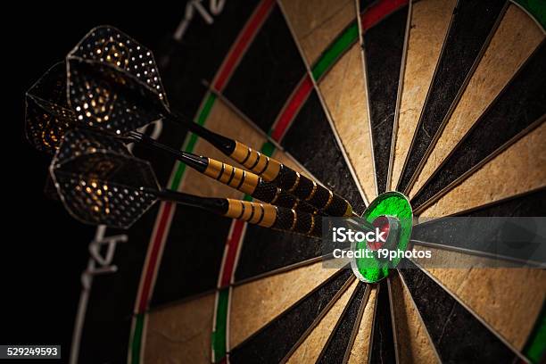 Three Darts In Bulls Eye Close Up Stock Photo - Download Image Now - Darts, Dart, Dartboard