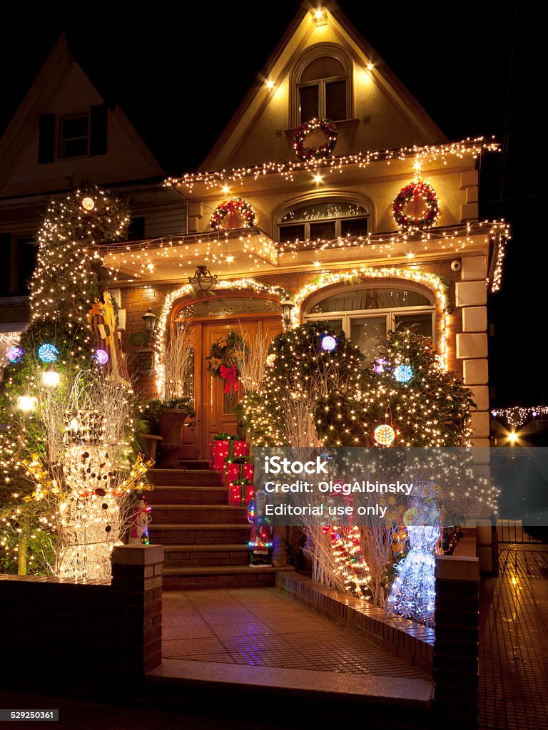 Luxury Brooklyn House with Christmas Lights at night, New York. Brooklyn, NY, USA - December 15, 2014: Night view of a Luxury Home with Christmas Lights in Dyker Heights neighbourhood of Brooklyn. Dyker Heights Stock Photo