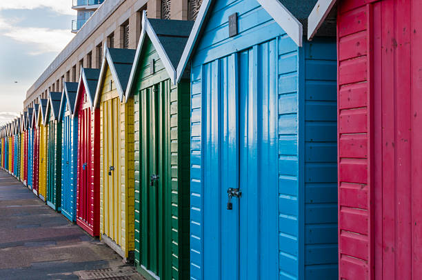 Multi Coloured Beach Huts Multi Coloured Beach Huts boscombe photos stock pictures, royalty-free photos & images