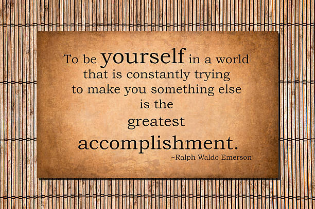 To be yourself - Ralph Waldo Emerson quote stock photo