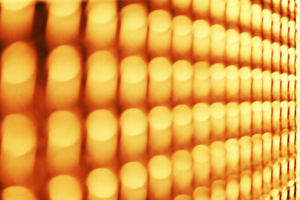 row of blurred yellow lights stock photo