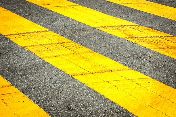 istock Tire mark on yellow traffic line on the road 529253793