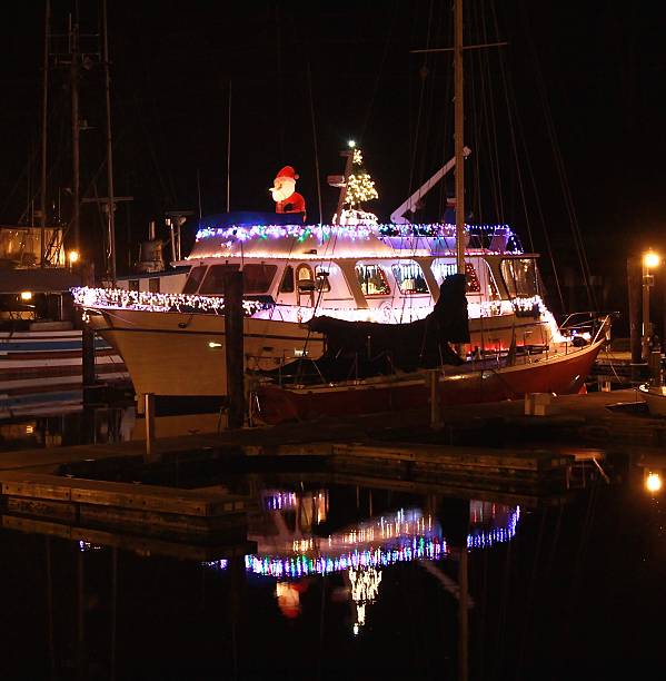 Night Shot Of Boat Decorated With Christmas Lights stock photo