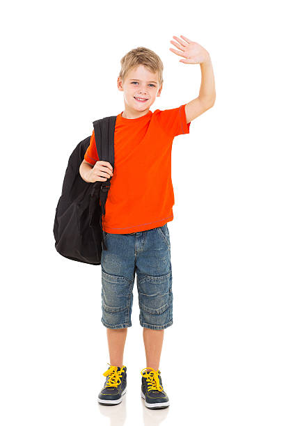 schoolboy waving goodbye smiling schoolboy with backpack waving goodbye kid waves stock pictures, royalty-free photos & images