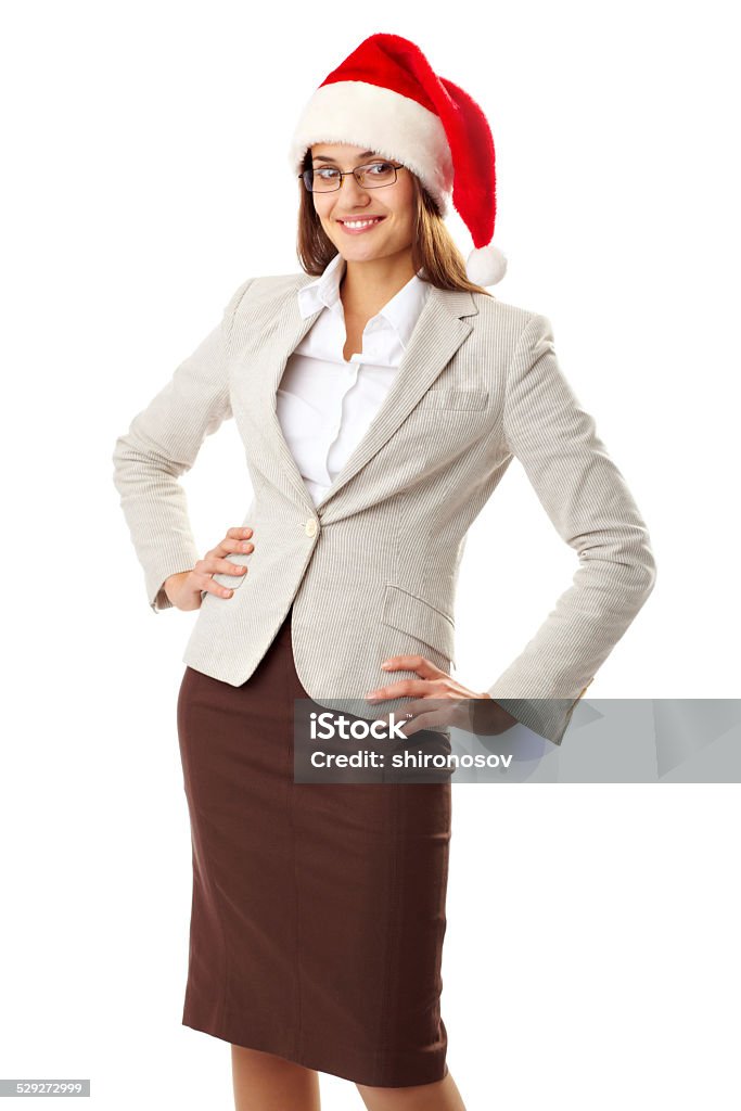 Pretty Santa Portrait of elegant businesswoman in Santa cap looking at camera in isolation Adult Stock Photo