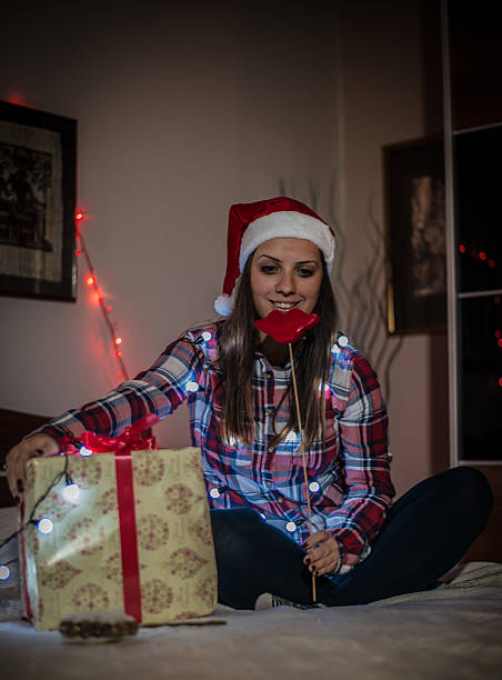 istock Christmas gift girl 529273015