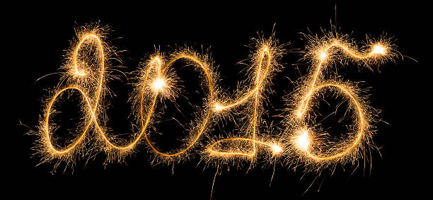 istock Happy New Year - 2015 with sparklers 529273429