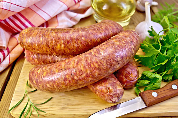 istock Sausages beef on board with knife 529274413