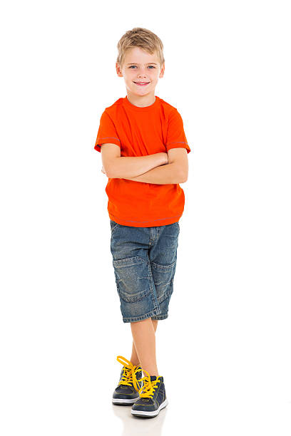 istock little boy with arms crossed 529274441
