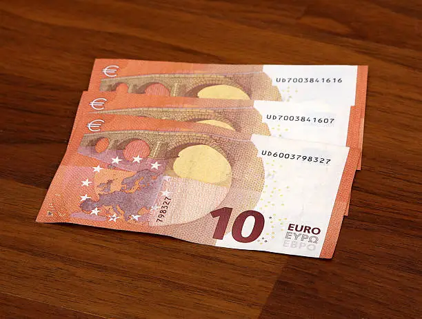 Photo of new ten 10 euro banknote greenback paper money